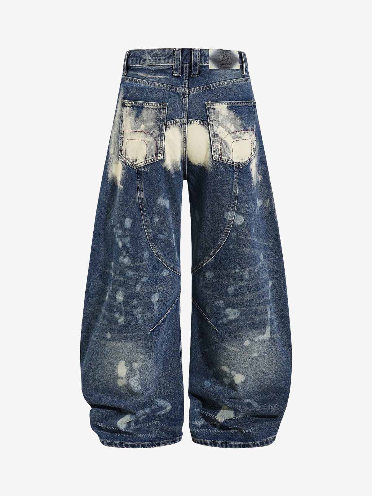 Multi-Eyelet Distressed Gradient Baggy Jeans